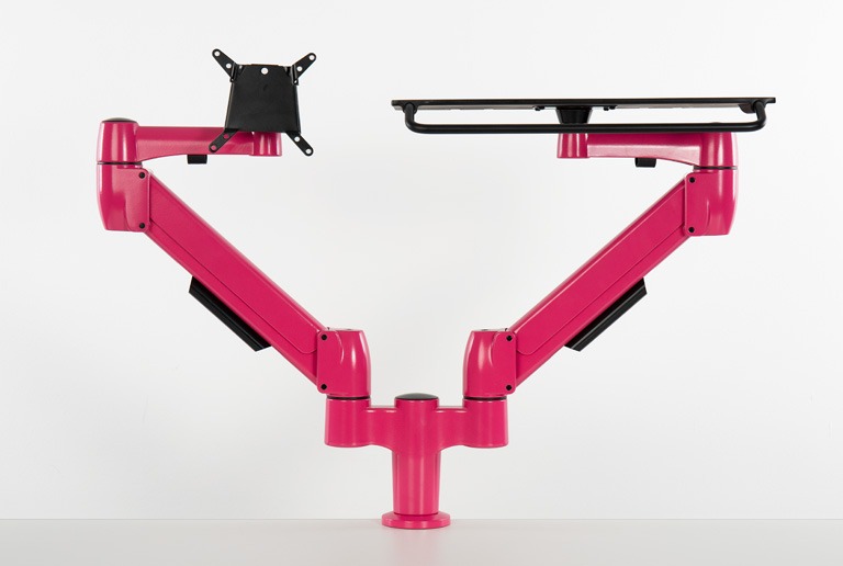 Double SpaceArm monitors arms in bespoke pink colour with VESA mount and laptop platform